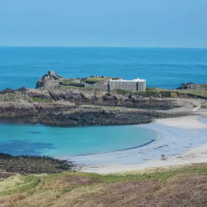 View over Chateau A L Etoc (Chateau Le Toc) and Saye Beach, Alderney, Channel Islands