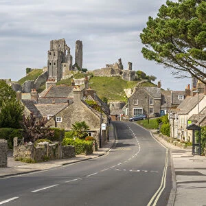 View of cottages on East Street and Corfe Castle, Corfe, Dorset, England, United Kingdom