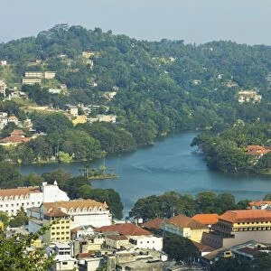 View east to the lake and the white Queens Hotel on left and Kandy City Centre shopping complex in centre, Kandy, Sri