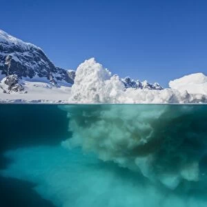 Above and below view of glacial ice near Wiencke Island, Neumayer Channel, Antarctica, Polar Regions