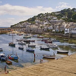 View of the harbour at mid-tide, Mousehole, Penwith, Cornwall, England, United Kingdom