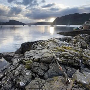 View over Loch Carron at dawn from rocks near the harbour, Plockton, Kintail