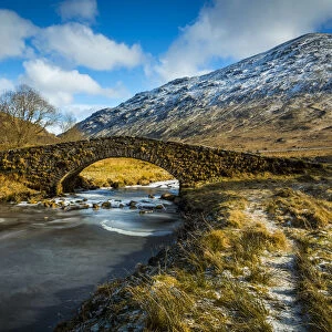 View of mountains and Cattle Bridge in winter, in the Argyll Forest and National Park