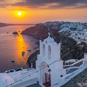 View of Oia village at sunset, Santorini, Aegean Island, Cyclades Island, Greek Islands