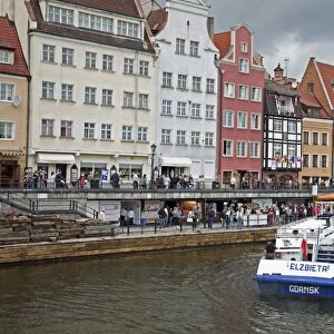 View along River Motlawa showing harbour and old Hanseatic architecture, Gdansk, Pomerania, Poland, Europe