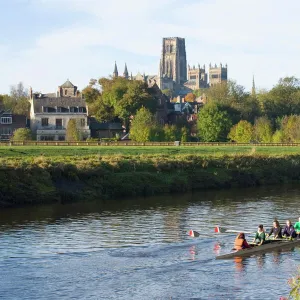 View across the River Wear to Durham Cathedral, female college rowers in training, Durham, County Durham, England, United Kingdom, Europe