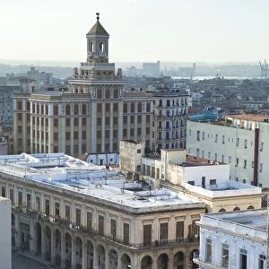 View over rooftops of Havana towards The Bacardi Building from the 9th floor restaurant of Hotel Seville, Havana Centro, Cuba