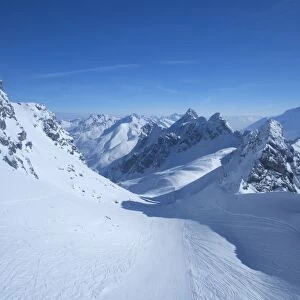 View from summit of Valluga in St. Anton am Arlberg in winter snow, Austrian Alps
