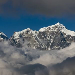 A view of Taboche through the clouds seen from Kongde in the Everest region, Nepal