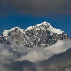 A view of Taboche through the clouds seen from Kongde in the Everest region, Nepal