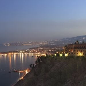 View from Taormina at dusk of coast and Mount Etna, Sicily, Italy, Europe