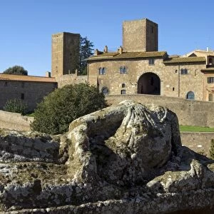View of Tuscania from Bastianini Square and Etruscan sarcophagus