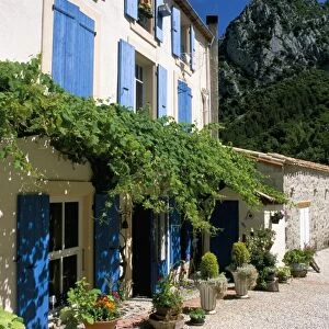 Village house with blue shutters, Lapradelle-Puilaurens, Aude, Languedoc-Roussillon