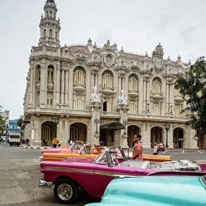 Vintage American cars parked outside the Gran Teatro (Grand Theater), Havana, Cuba