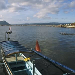 Volcano and colourful Banka fishing boats
