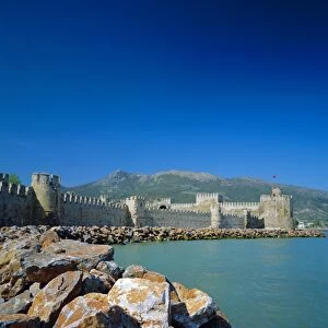 Walls and towers of Mamure Kalesi on the Mediterranean sea