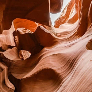 Water eroded Navajo Sandstone forms a slot canyon in Upper Antelope Canyon, Navajo Land