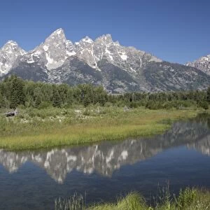 Water reflections of the Teton Range, taken from the end of Schwabacker Road, Grand Teton National Park, Wyoming, United States of America, North America