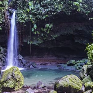 Waterfall splashing in the Emerald Pool in Dominica, West Indies, Caribbean, Central America