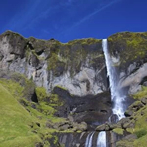 Waterfall in summer sunshine at Foss a Sidu, South coast, Iceland, Polar Regions