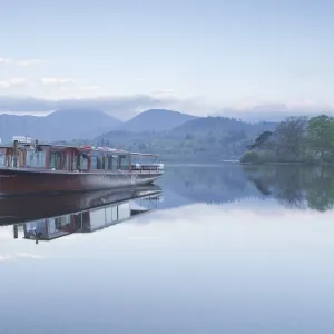 The still waters of Derwent Water in the Lake District National Park, Cumbria, England, United Kingdom, Europe