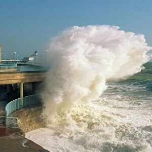 Waves pounding bandstand, storm in Eastbourne, East Sussex, England, United Kingdom