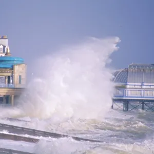 Waves pounding bandstand in a storm on the south coast, Eastbourne, East Sussex