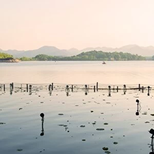 West Lake at dusk, Hangzhou, Zhejiang, China, Asia