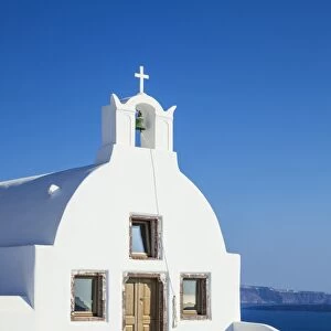 White church of Agios Vasilios overlooking Aegean Sea, Oia, Santorini (Thira), Cyclades Islands, Greek Islands, Greece, Europe