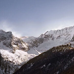 Wind gusting on Hochgall peak in winter, Trentino-Alto Adige, Italy, Europe