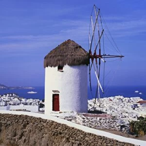 Windmill and View of Mykonos by the Coast, Cyclades, Greece