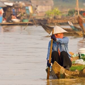 Woman in boat, Chong Kneas floating village, Tonle Sap Lake, Siem Reap