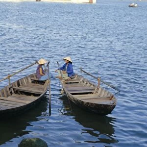 Two women in boats