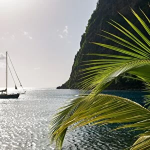 Yacht moored close to the base of Petit Piton, UNESCO World Heritage Site, near Sugar