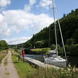 Yacht moored in Crinan Canal, Highlands, Scotland, United Kingdom, Europe