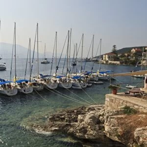 Yachts and ships at anchor, Fiskardo, Kefalonia (Cephalonia), Ionian Islands, Greek Islands, Greece, Europe