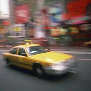Yellow cab on the street in Times Square in New York, United States of America