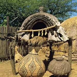 Zulu sleeping quarters with food storage just outside