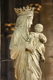 Virgin And Child Prints: A 14th century Virgin and Child statue in Notre Dame cathedral, Paris, France, Europe