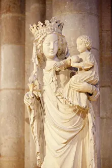 A 14th century Virgin and Child statue in Notre-Dame de Paris cathedral, Paris, France A 14th century Virgin and Child statue in Notre-Dame de Paris cathedral, Paris, France