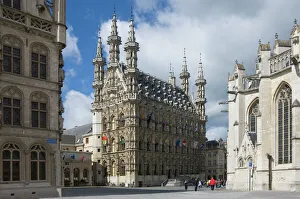Decorated Prints: The 15th century late Gothic Town Hall in the Grote Markt, Leuven, Belgium, Europe
