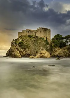 Theatres Prints: The 16th century Lovrjenac Fortress at sunset with a long exposure ocean foreground