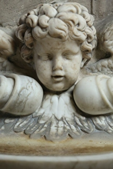 Cherub Prints: The 17th century holy water font, St. Germain l Auxerrois church, Paris, France, Europe