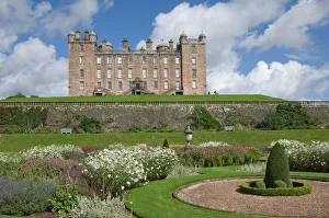The 17th century Renaissance Drumlanrig Castle (Pink Palace) built by the 1st Duke of Queensberry, William Douglass, from the lower garden terrace, Dumfries and Galloway, Scotland, United Kingdom, Europe The 17th century Renaissance Drumlanrig Castle (Pink Palace) built by the 1st Duke of Queensberry, William Douglass, from the lower garden terrace, Dumfries and Galloway, Scotland, United Kingdom, Europe