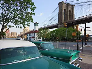 Connection Prints: Two 1950s cars parked near the Brooklyn Bridge at Fulton Ferry Landing
