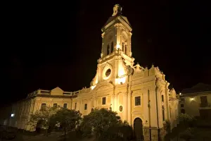 The 19th century Church of San Francisco illuminated at night on Plaza San Francisco in this attractive colonial capital, Cuenca, Azuay Province, Southern Highlands, Ecuador