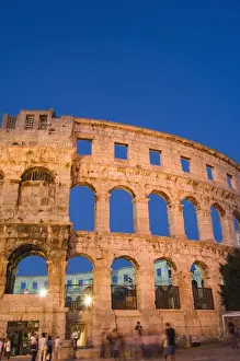 Pula Prints: The 1st century Roman amphitheatre bathed in early evening light, Pula