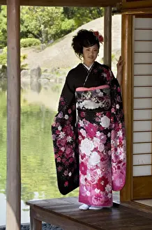 20 25 Years Prints: A 20-year old Japanese girl wearing spring furisode kimono with long sleeves to indicate her single social status