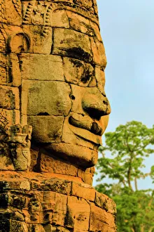 Remains Gallery: One of 216 smiling sandstone faces at 12th century Bayon, King Jayavarman VIIs last