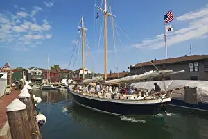 The 80 foot excursion schooner Aquidneck returning to Bowens Wharf